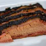 Four Smoked Brisket Slices — Roger That Bbq © 2024 Rogerthat.com © 2025