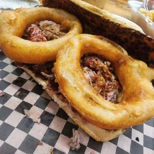 Smoked Pulled Pork With Onion Rings Sandwich — Roger That Bbq © 2024 Rogerthat.com © 2025